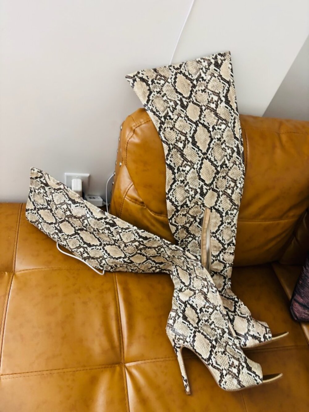 snake skin print over the knee boots